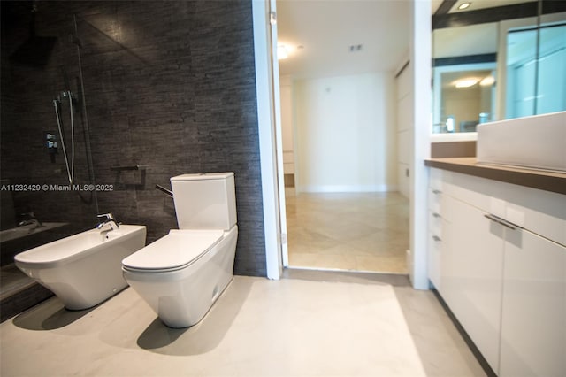 bathroom featuring a bidet, tile walls, toilet, and tile flooring