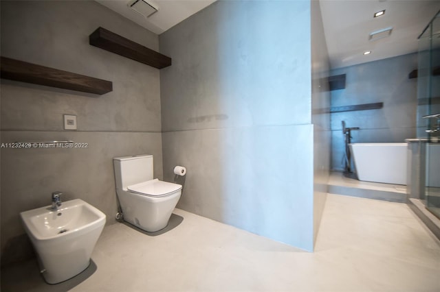 bathroom featuring toilet, a bidet, and a shower with door