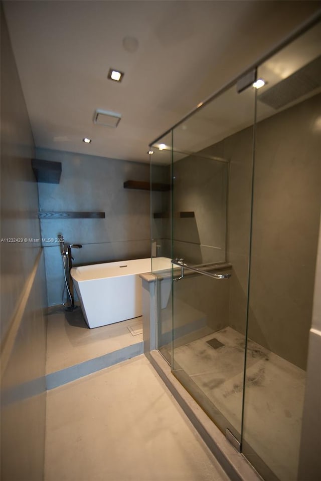 bathroom with an enclosed shower