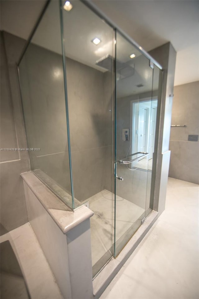 bathroom with an enclosed shower