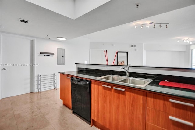 kitchen featuring sink, light tile floors, dishwasher, and track lighting