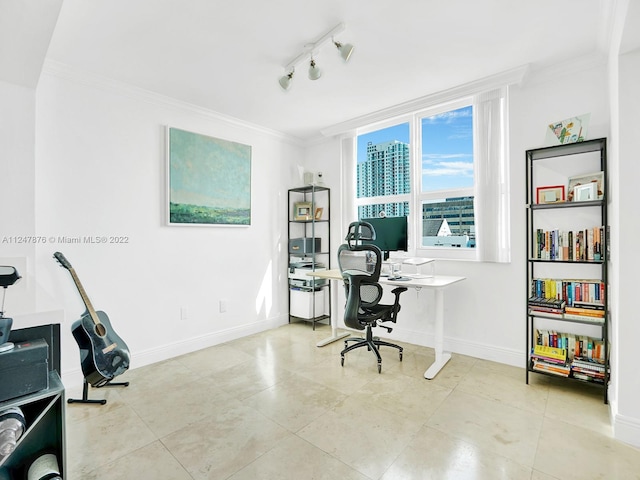 tiled home office featuring rail lighting and ornamental molding