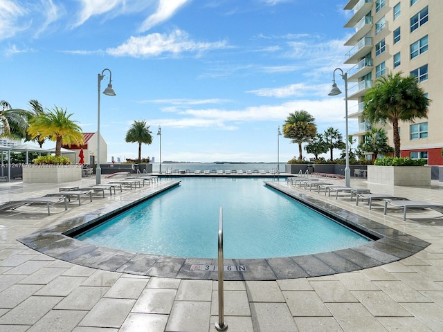 view of pool featuring a patio area