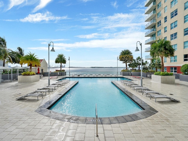 view of swimming pool with a patio area