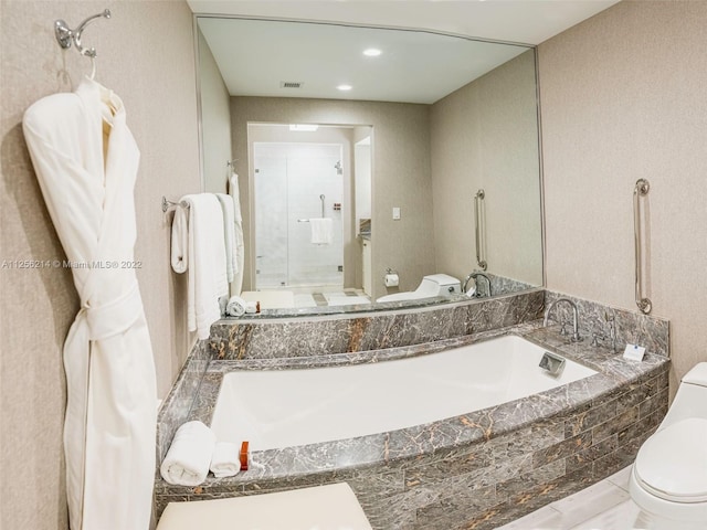 bathroom with toilet and tile flooring