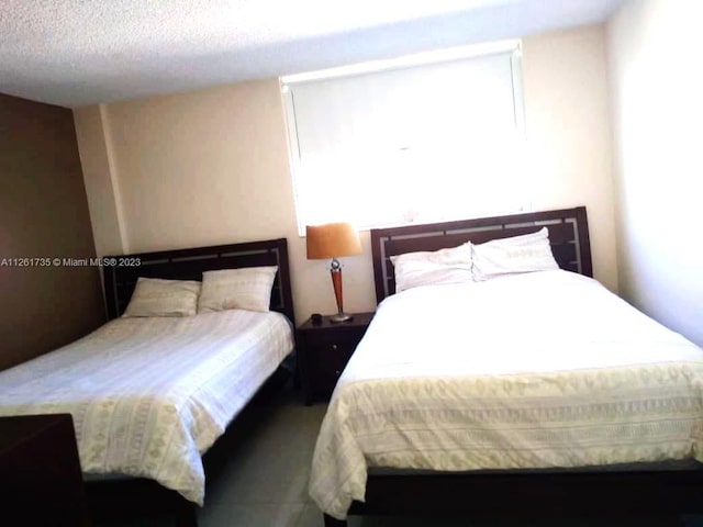 bedroom with a textured ceiling