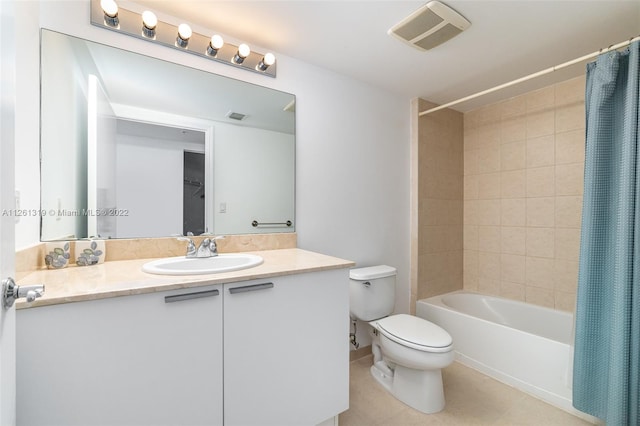 full bathroom with tile patterned flooring, vanity, toilet, and shower / bathtub combination with curtain