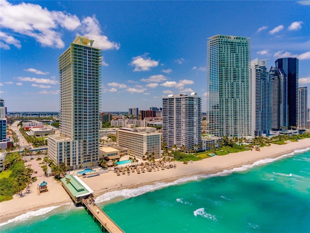 exterior space featuring a view of the beach and a water view