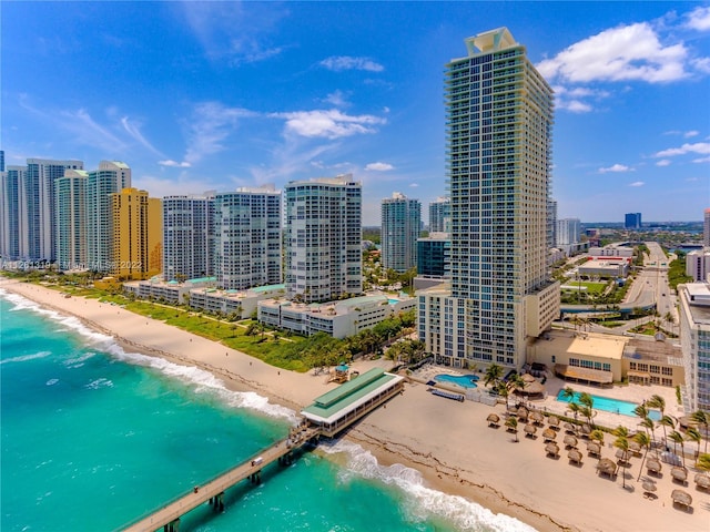 city view featuring a beach view and a water view