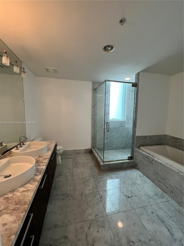 full bathroom with shower with separate bathtub, toilet, dual bowl vanity, and tile flooring