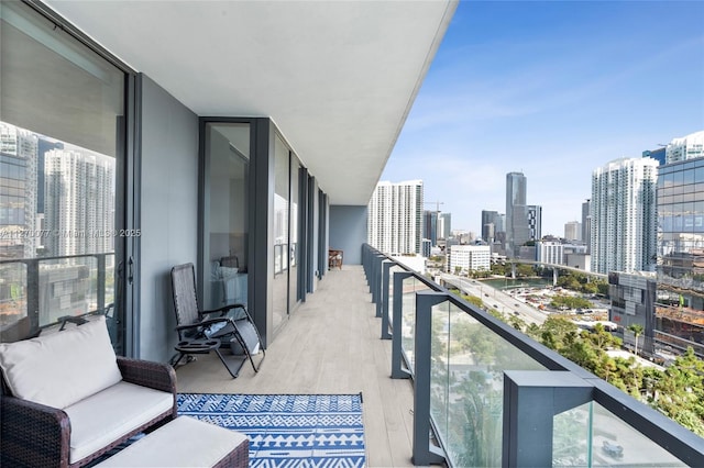 balcony featuring a view of city