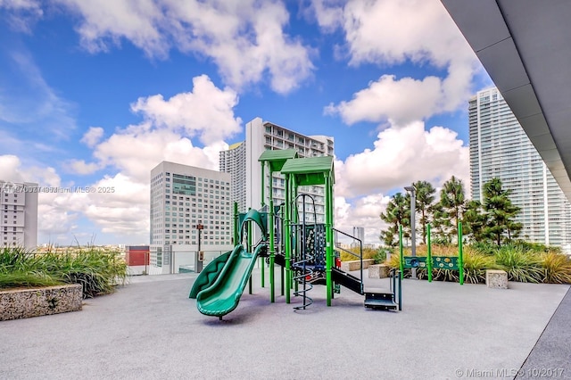 community playground with a view of city