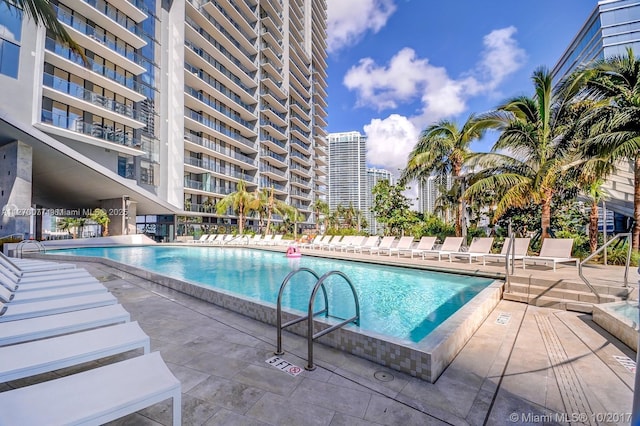 pool with a patio area