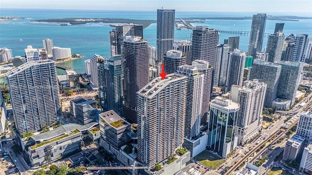 drone / aerial view with a water view and a view of city