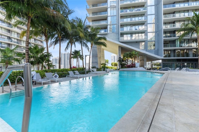 community pool featuring a patio area