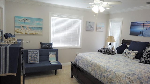 bedroom with ceiling fan and ornamental molding