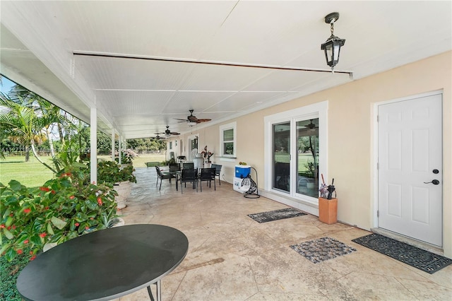 view of terrace featuring ceiling fan