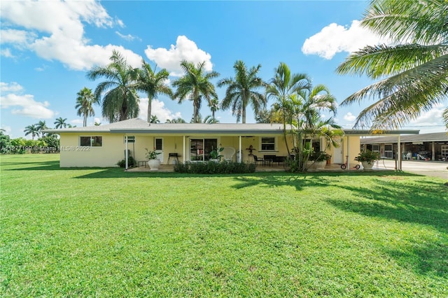 view of front of house with covered porch and a front yard