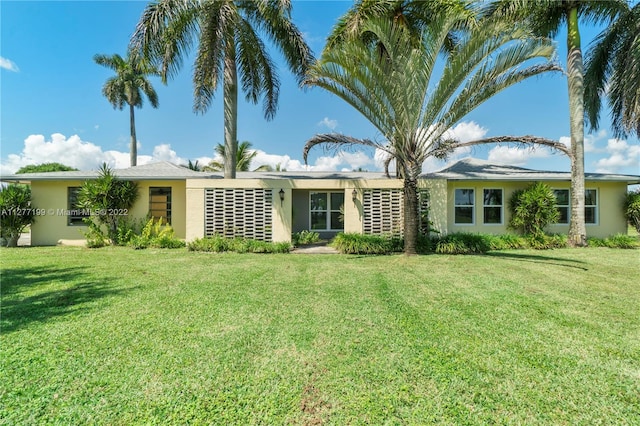 view of front of home with a front yard