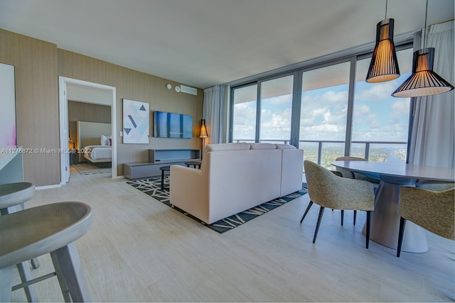 living room with a wall of windows