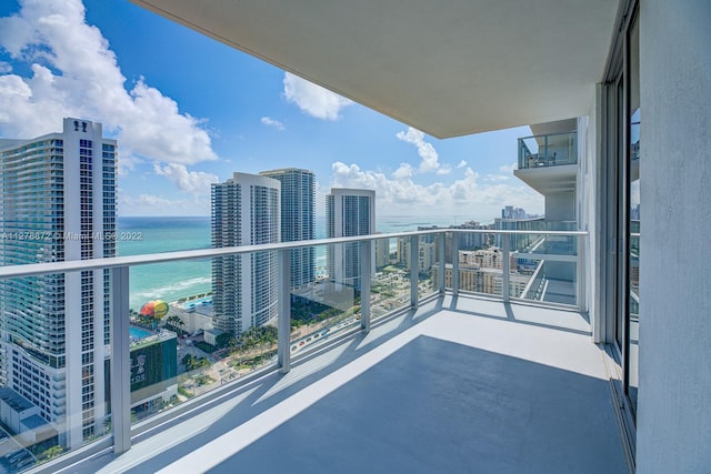 balcony featuring a water view