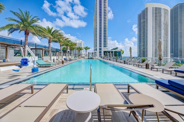 view of swimming pool featuring a patio area