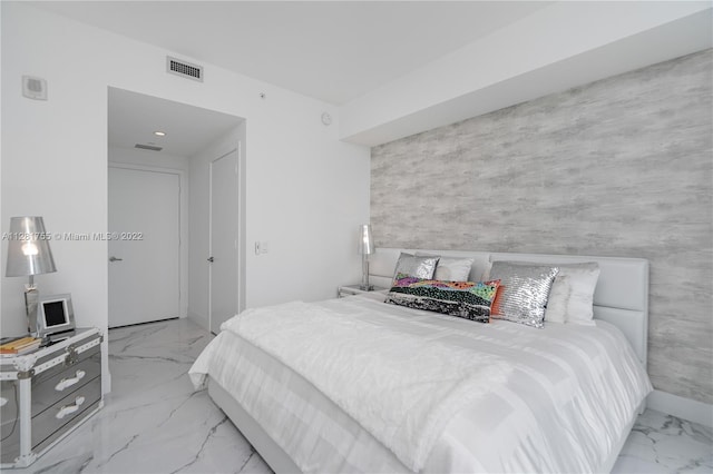 bedroom featuring light tile flooring