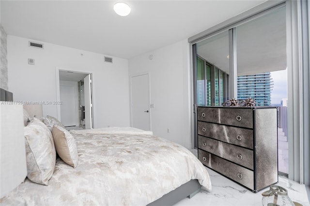 bedroom with expansive windows