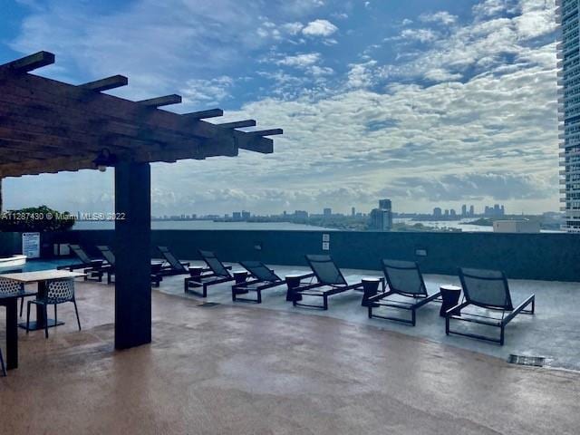 view of terrace featuring a pergola