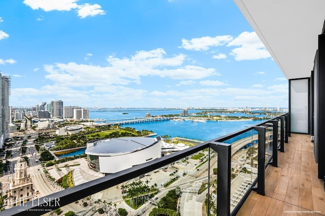 balcony featuring a water view