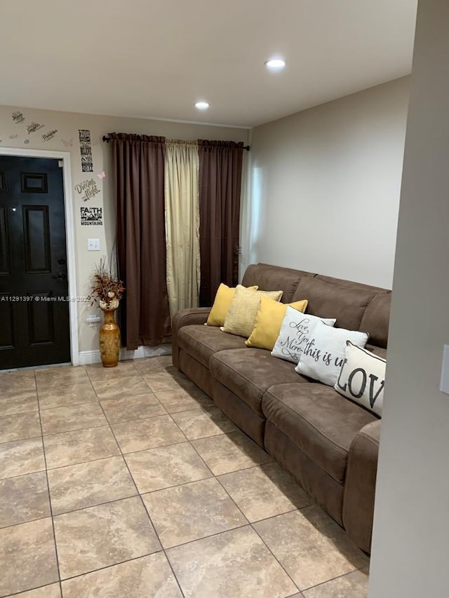 living room with light tile floors