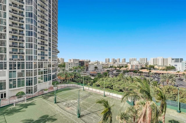 exterior space with tennis court