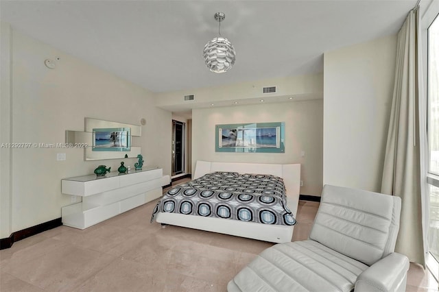 bedroom with multiple windows and light tile floors