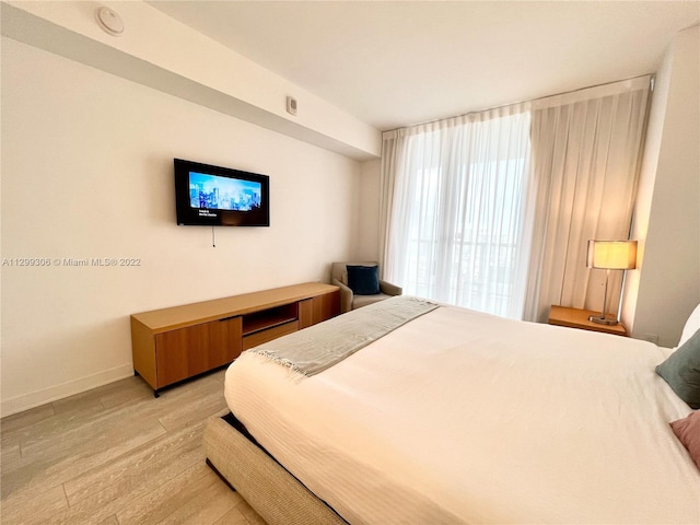 bedroom featuring light hardwood / wood-style flooring