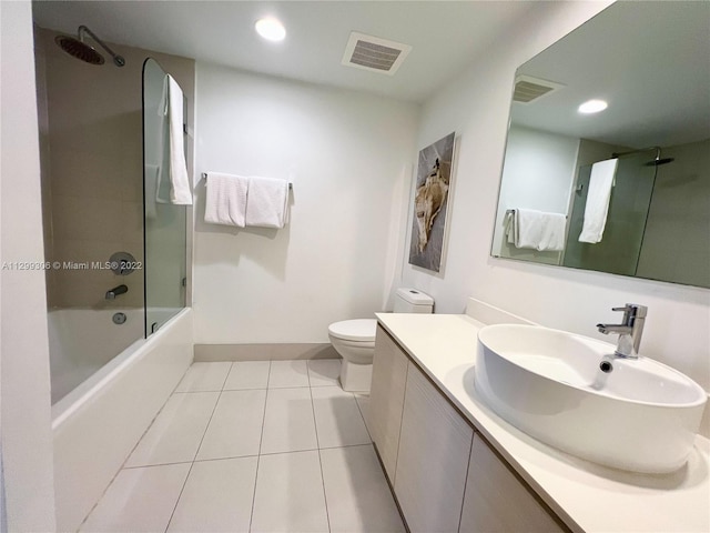 full bathroom with toilet, vanity, washtub / shower combination, and tile flooring