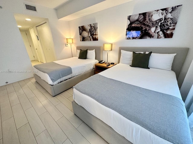 bedroom featuring light hardwood / wood-style flooring