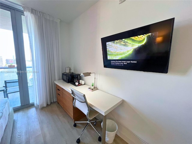 home office featuring light hardwood / wood-style floors