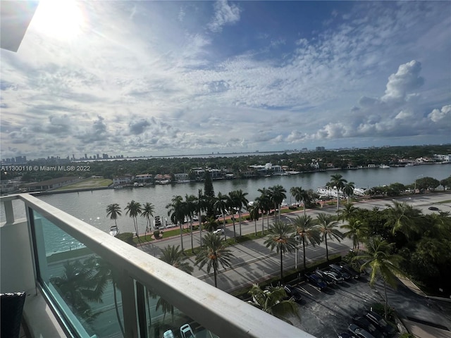 balcony featuring a water view