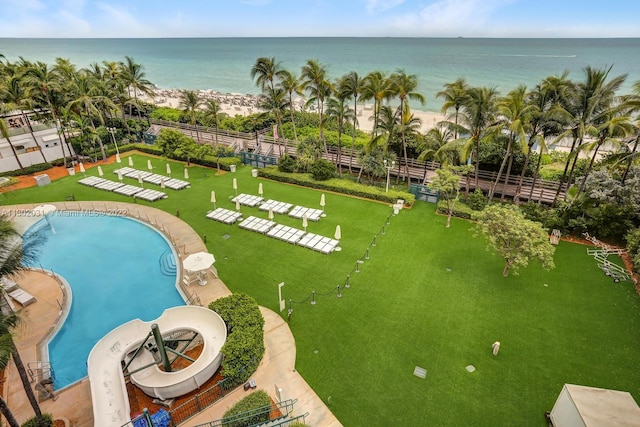 view of swimming pool with a water view