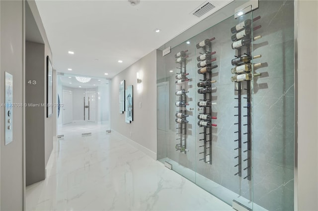 wine cellar featuring light tile flooring