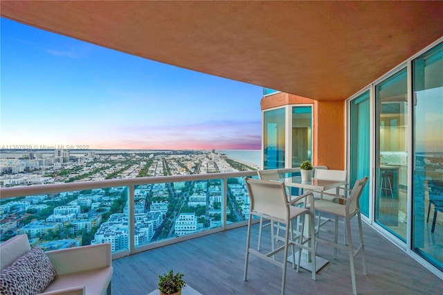 balcony at dusk with a water view