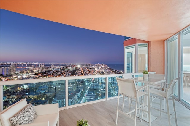 view of balcony at dusk