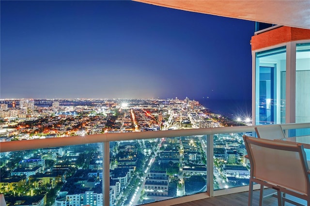 view of balcony at twilight