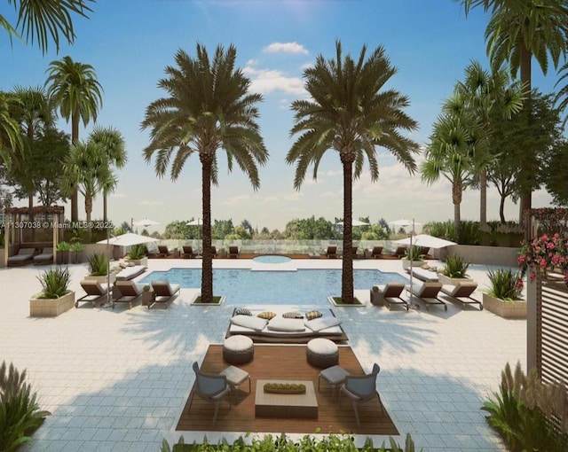 view of pool with a patio area and an outdoor living space