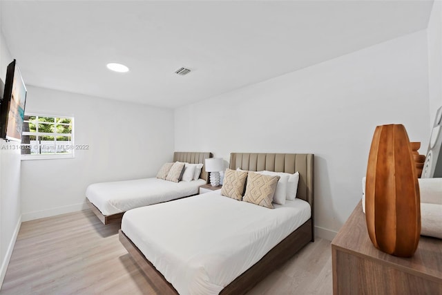 bedroom featuring light hardwood / wood-style flooring