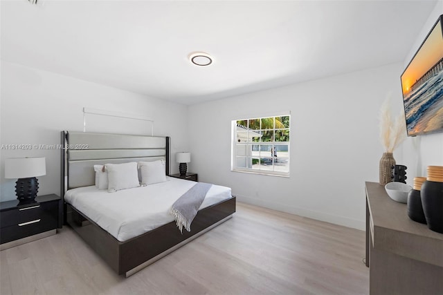 bedroom featuring light hardwood / wood-style floors