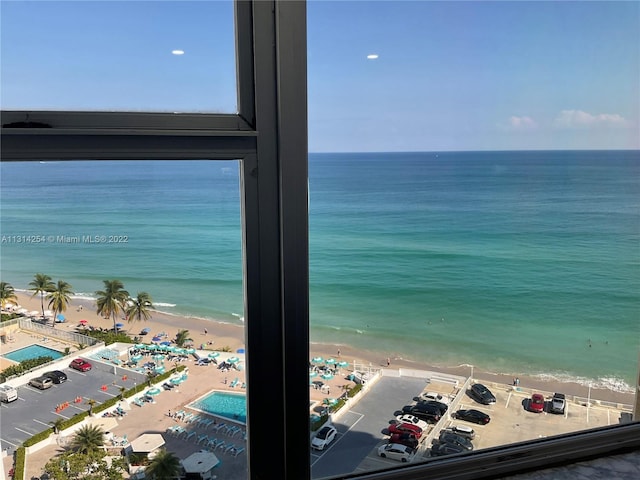 view of water feature with a beach view