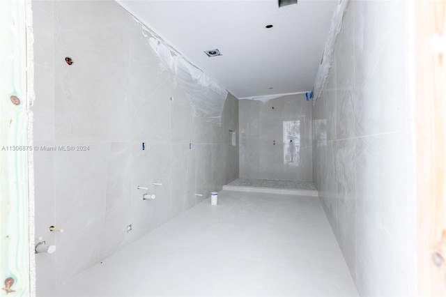 interior space with a tile shower