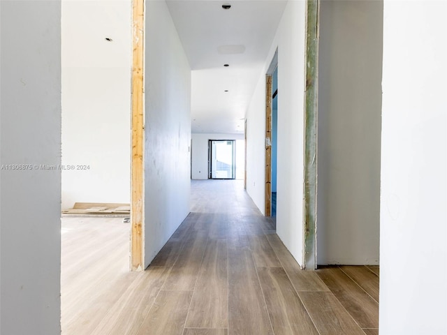 hallway featuring light wood-type flooring