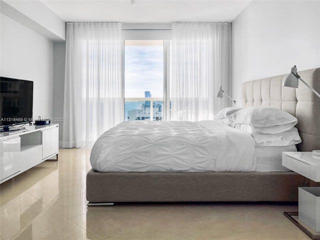 bedroom with light tile floors